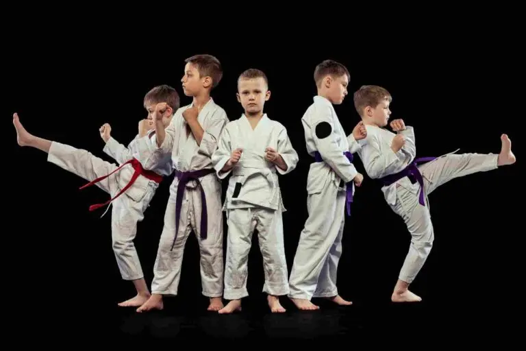 Kids in a jiujitsu pose